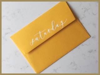 Bílá kaligrafie na obálce Colorplan Citrine (Paper Parade Stationers)